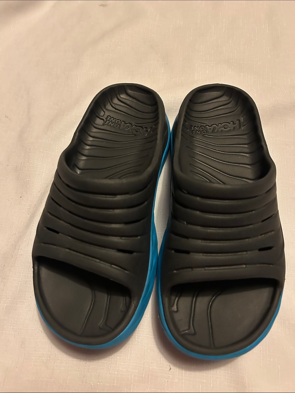 Hoka Black and Blue Slide Sandals